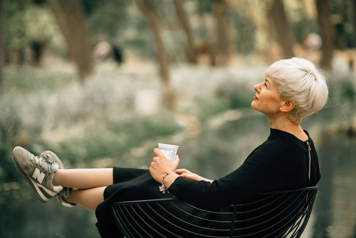 woman contemplating in chair